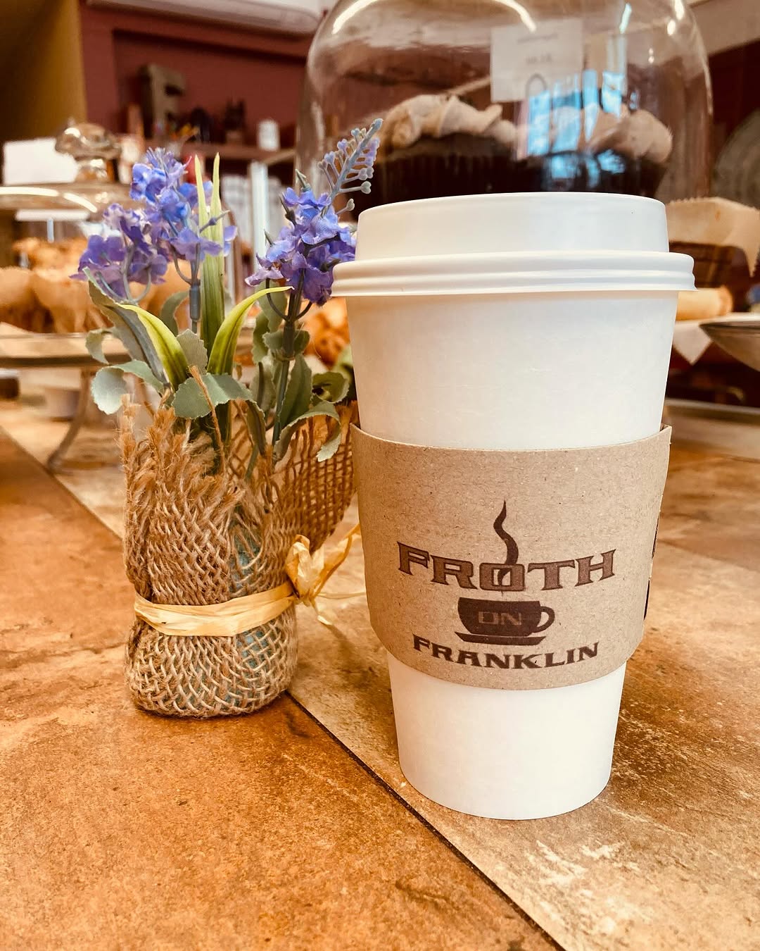 FROTH on Franklin branded coffee cup
